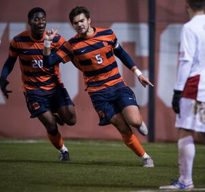 Louis Cross' late goal pushed the Orange to a 2-1 win over N.C. State on Friday night at SU Soccer Stadium.