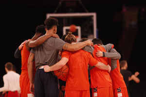 The Orange huddle during its pregame routine on Sunday at MSG. 