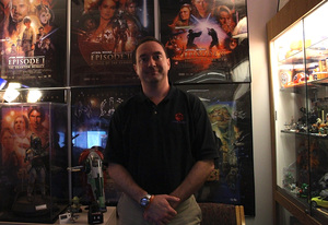 Scott Casanova, a third generation SU alumnus is a huge Syracuse sports fan. His office is lined with Orange memorabilia and Star Wars collectables, his other great passion.