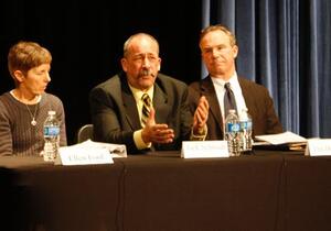 (From left to right) Ellen Ford, Jack Schmidt and Tim Donovan participate in a Q-and-A session during a town hall meeting, which focused on child sexual abuse in athletics.