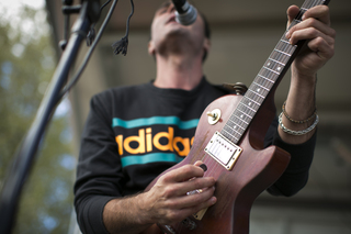 Mike Kamerman of Smallpools shows off his guitar playing skills.