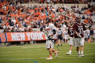 SU attack Kevin Rice calmly pumps his fist after a play. 