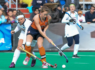 Emma Russell fights for a ball against a UConn player. The Huskies were the No. 3 seed in the NCAA tournament and the defending champions.