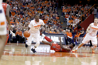 Kaleb Joseph speeds past half court after a St. John's defender took a spill on the hardwood. 