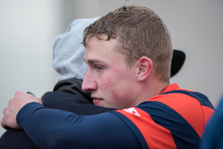 Callahan hugs someone after the game.